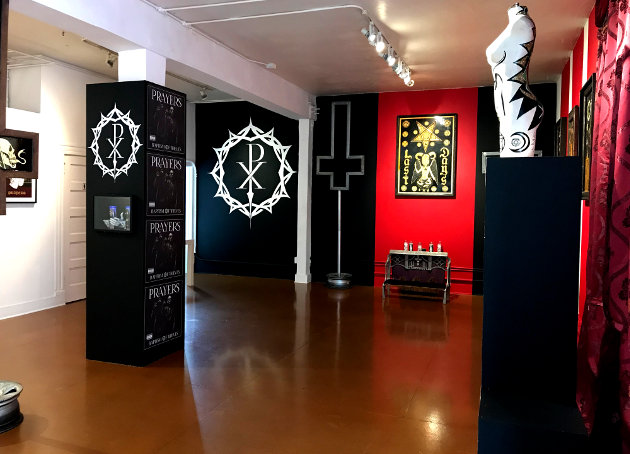 "The Pain Isn't Over" art exhibit by Leafar Seyer of Prayers