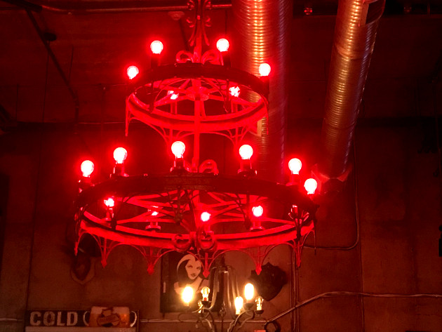 The red chandelier that hangs above the dining area
