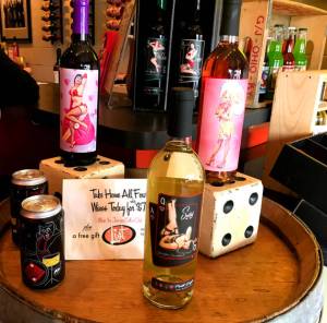 Sort This Out Cellars wines feature pin-up models on bottles
