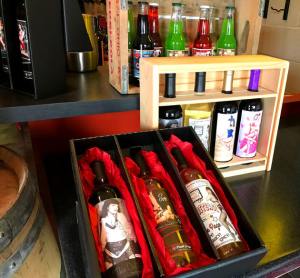 Sort This Out Cellars wines feature pin-up models on bottles