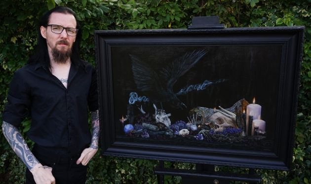Martin Darkside photographed with his "Witchcraft" still life oil painting