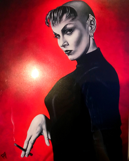 An art print I own showing Maila Nurmi with a shaved head