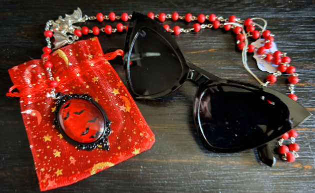 Necklace from Weird Sistas and bat sunglasses