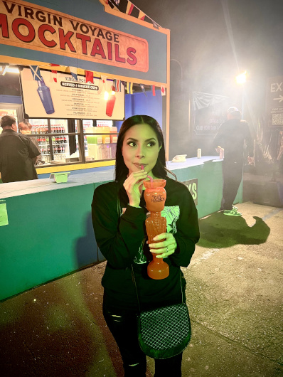 Vamp Jenn sipping a mocktail